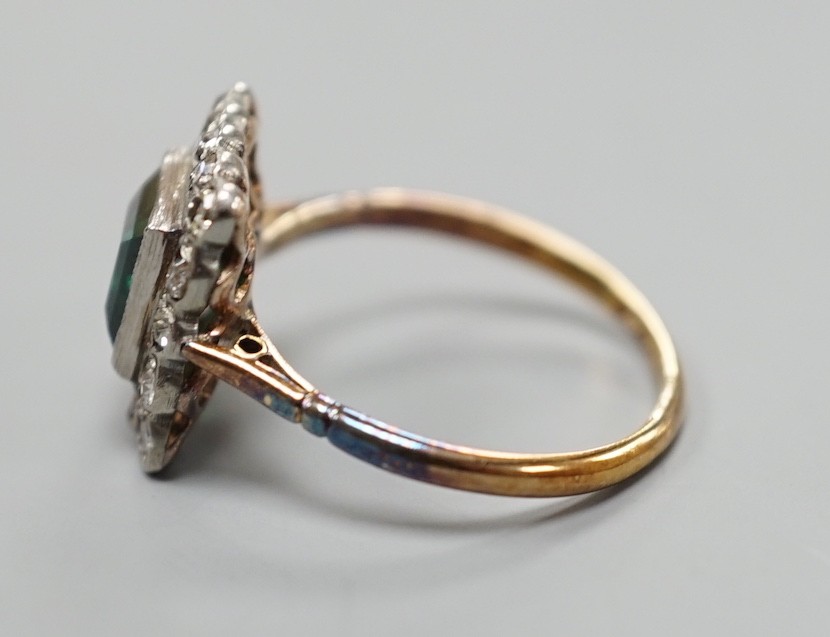An 18ct gold, green paste? and diamond set square cluster ring, size L, gross weight 2.2 grams.